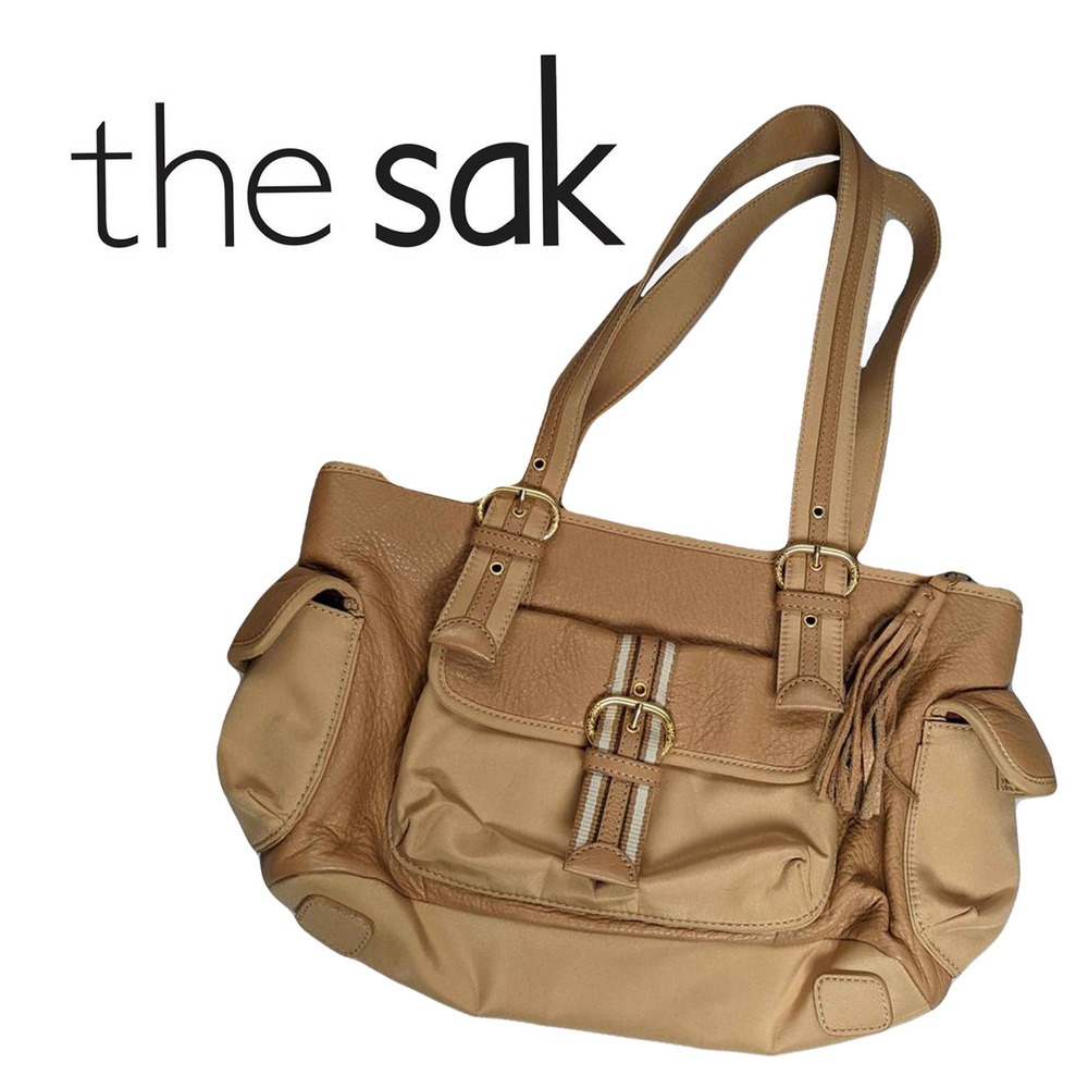 The Sak Leather Tan Purse with Maroon Lining